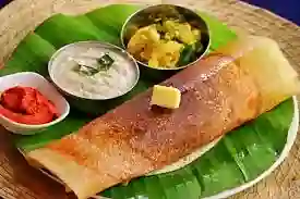 Crispy Masala Dosa, a South Indian favorite at Sawali Pure Veg, the best hotel in Dighi Pune